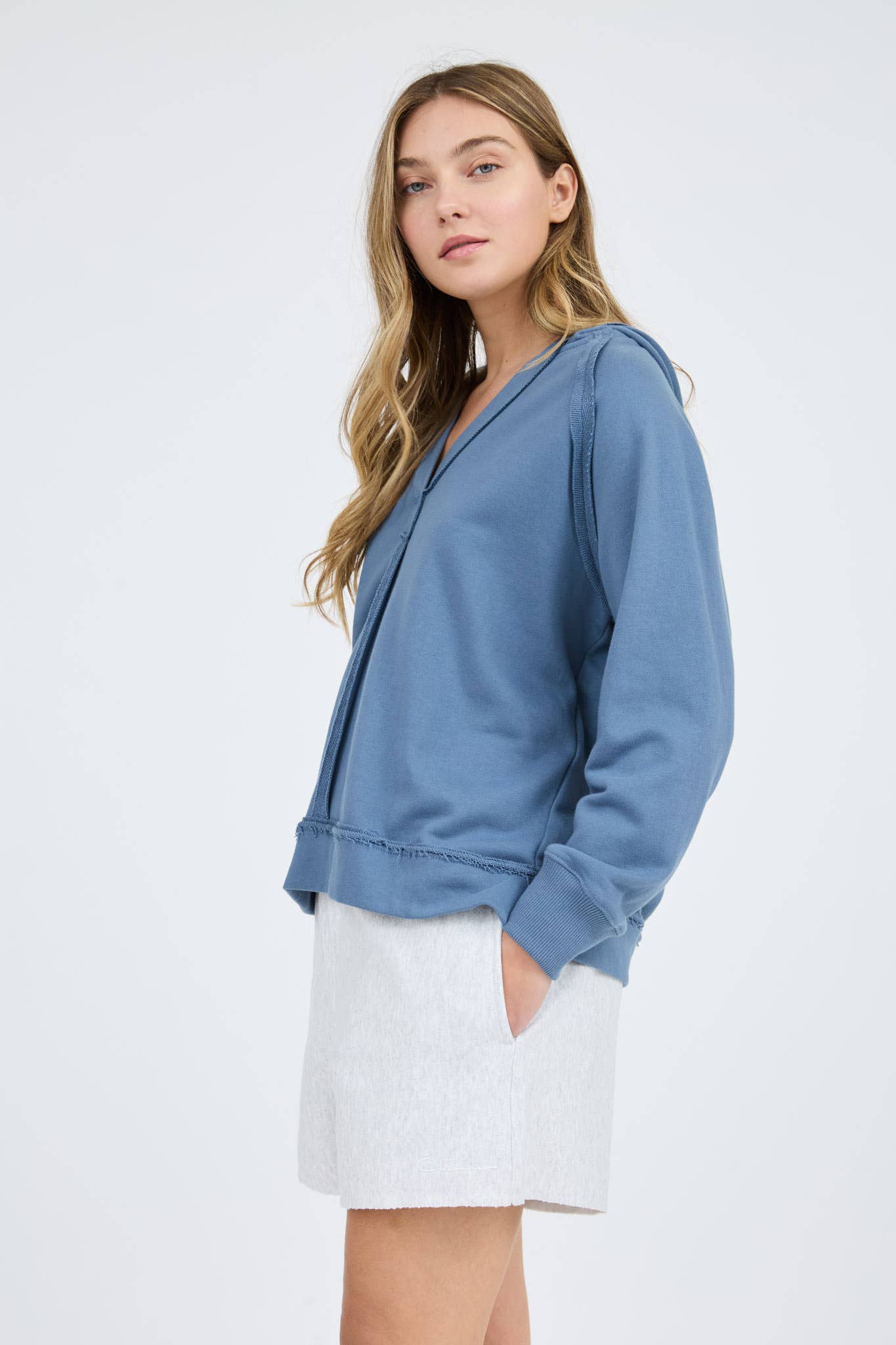 HOODED V NECK RAW EDGE LONG SLEEVE KNIT TOP